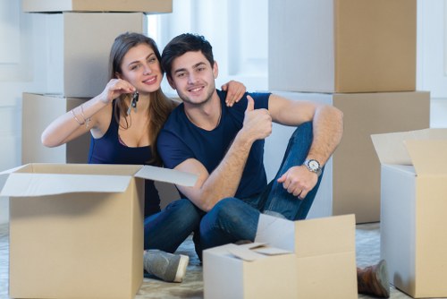 Removal team planning a London home move in a busy residential street