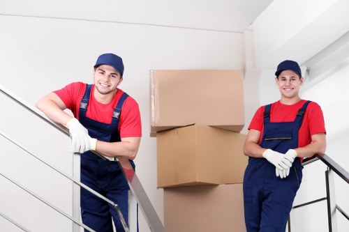 London moving team handling furniture in a residential property
