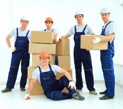 Careful moving service preparing boxes and furniture for delivery in London