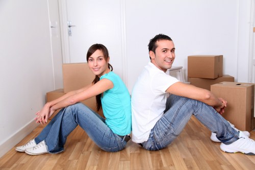 Unpacking service arranging boxes in a London property
