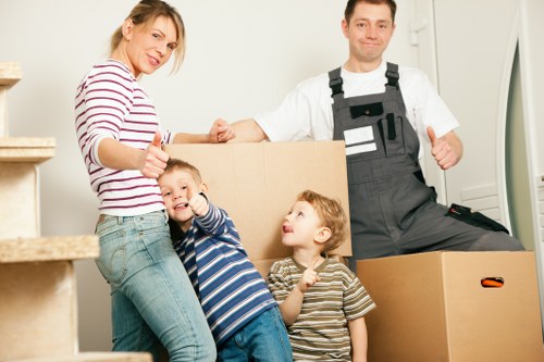 Professional movers loading boxes during a London relocation